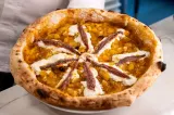  Românul care a impresionat Napoli cu cea mai bună pizza din lume. Cristian Meleacă a câștigat Trofeul Caputo la Campionatul Mondial de Pizza