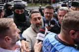 Mașina omului de afaceri Ionel Rusen, percheziționată de mascați: ce caută anchetatorii VIDEO