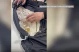 Româncă prinsă cu aproape un kilogram de aur ascuns în vestă
