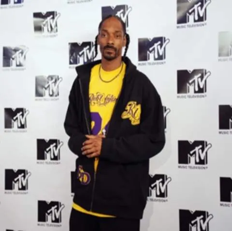 Snoop Dogg cere ajutorul Madonnei şi lui Beckham pentru a putea reveni în Marea Britanie