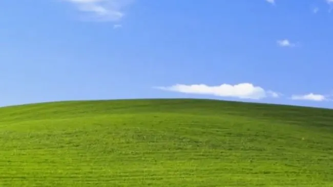 Povestea din spatele celui mai folosit wallpaper din lume. Ce secret ascunde peisajul "Bliss"