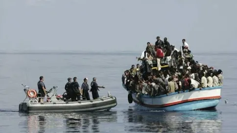 Cruzime şi moarte în masă. "Stăteau peste corpurile imigranţilor morţi" IMAGINI CUMPLITE