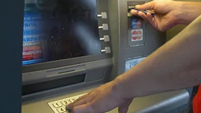 Doi HOŢI DE BANCOMATE, prinşi cu focuri de armă de poliţiştii bucureşteni