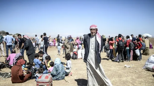 Fuga de Statul ISLAMIC. 100 000 de kurzi din Siria au fugit în Turcia