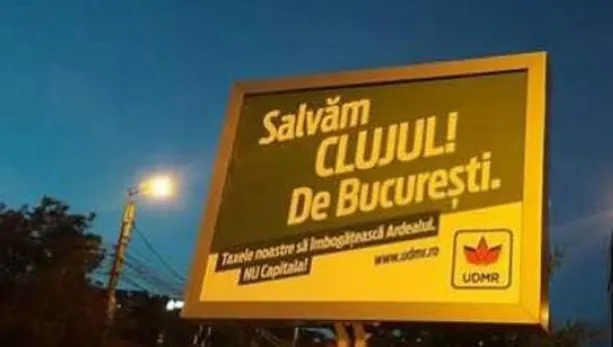 “Salvăm CLUJUL! De București.” Mesajul controversat de pe un panou electoral al UDMR