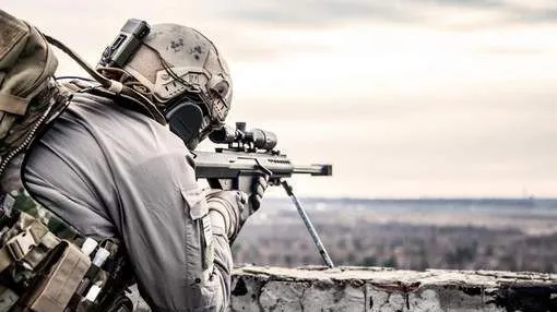RECORDUL unui lunetist britanic - a ucis un jihadist aflat la 2,4 km, cu cea mai puternică armă