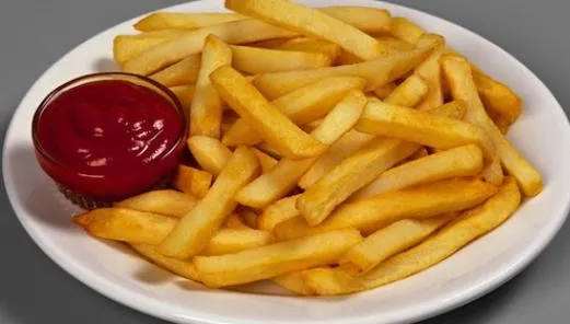 Ce se întâmplă în corpul tău când mănânci cartofi prăjiţi cu ketchup
