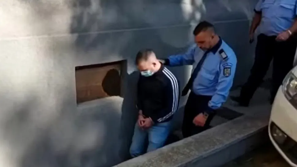 Polițitul bătăuș, în momentul reținerii