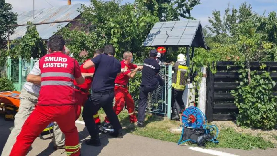 Bărbat căzut în fântână