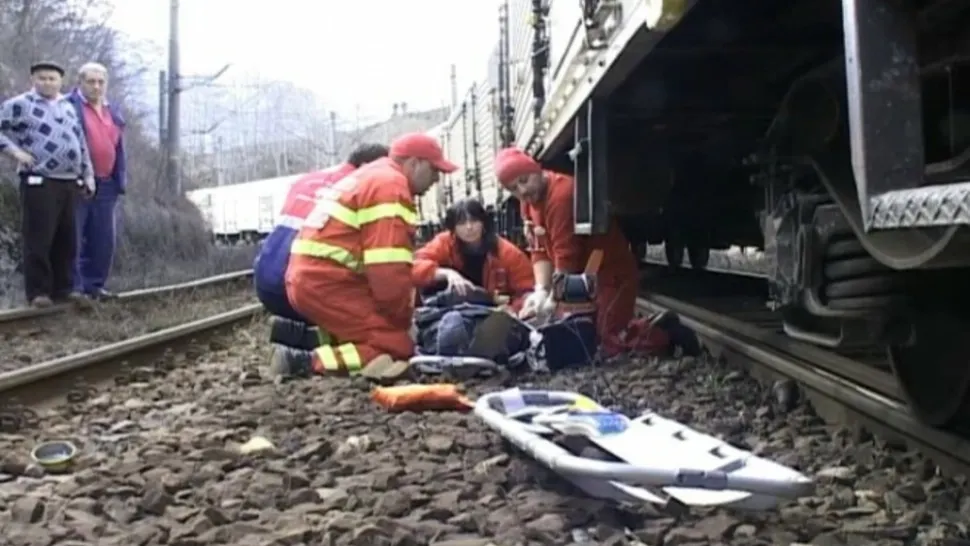 Femeie lovită de tren
