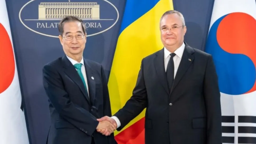Premierul Nicolae Ciucă alături de omologul sud-coreean, Han Duck-Soo. Foto/Guvern