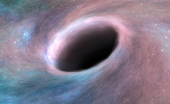 Au găsit o gaură neagră în spaţiu, de 660 milioane de ori mai mare ca Soarele. Ce se ascunde acolo