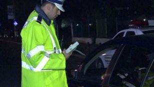 Poliţist bătut în trafic de un şofer beat