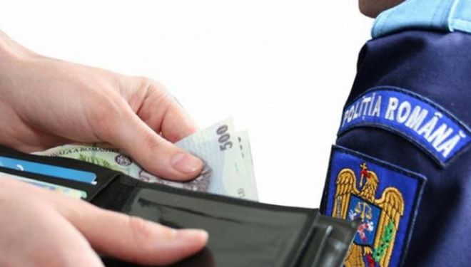 Polițist din Olt, prins în flagrant când primea mită