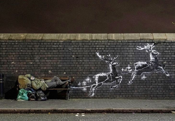 Graffiti de Craciun, creat de Bansky