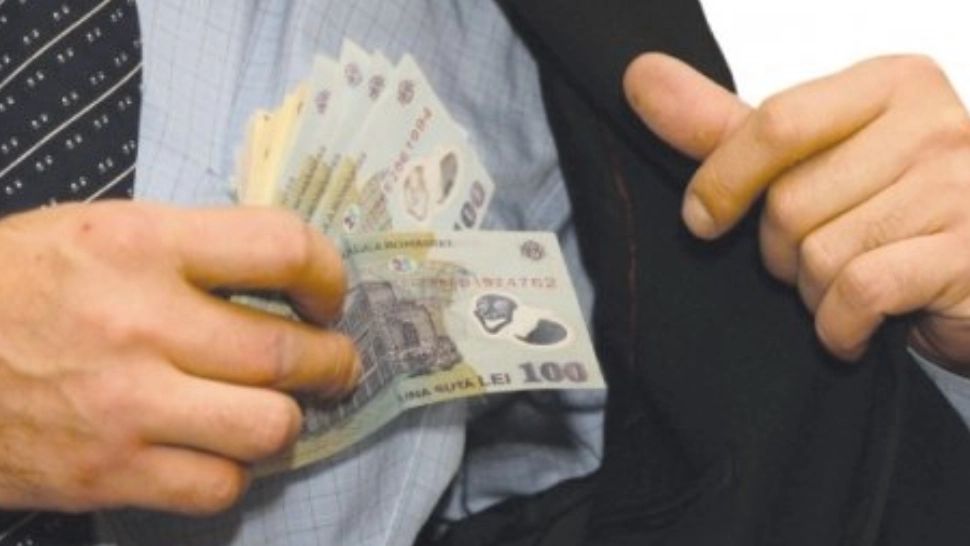 Profesor universitar, condamnat la 3 ani de închisoare pentru mită de la studenți