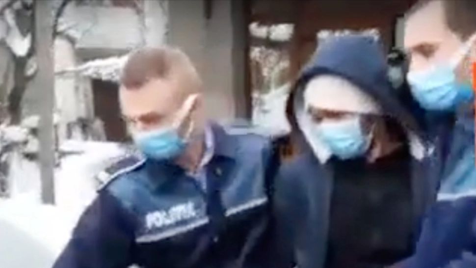 Suspectul marocan condus la audieri FOTO: Captura video