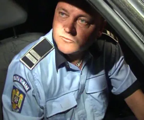 Un poliţist, aflat aproape în comă alcoolică, a omorât miercuri noapte un pieton