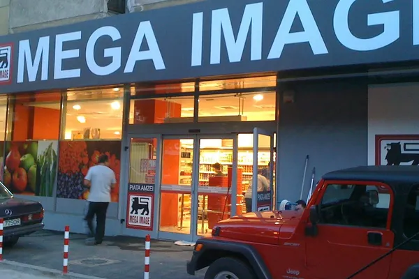 Un nou proprietar pentru Mega Image. Cine a cumpărat grupul belgian Delhaize