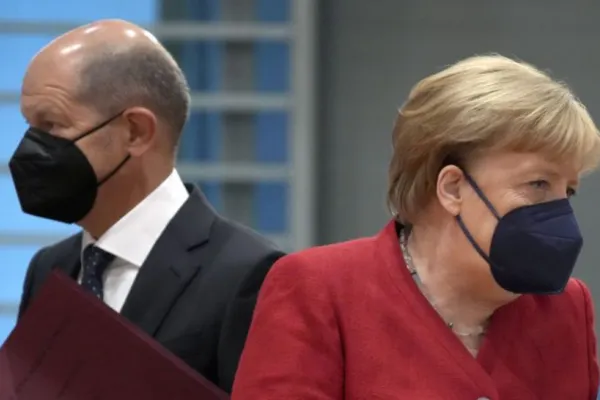 Germania va introduce noi RESTRICȚII de marți! Întâlnire între Angela Merkel și succesorul său Olaf Scholz