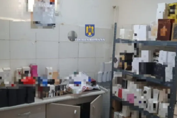 Polițiștii au confiscat parfumuri contrafăcute în valoare de aproximativ 700.000 de lei! Percheziții de amploare în București și Ilfov - VIDEO