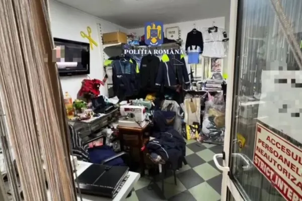 Fabrică ilegală de uniforme pentru polițiști, jandarmi și pompieri, descoperită într-un cartier din Brașov