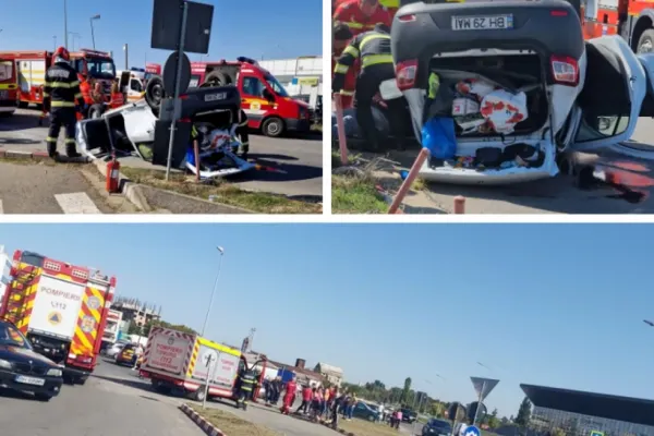 Accident rutier cumplit în Oradea: Mașină răsturnată în parcarea unui centru comercial