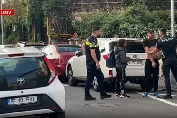 Scandal total în centrul Capitalei. Bărbat imobilizat de polițiști
