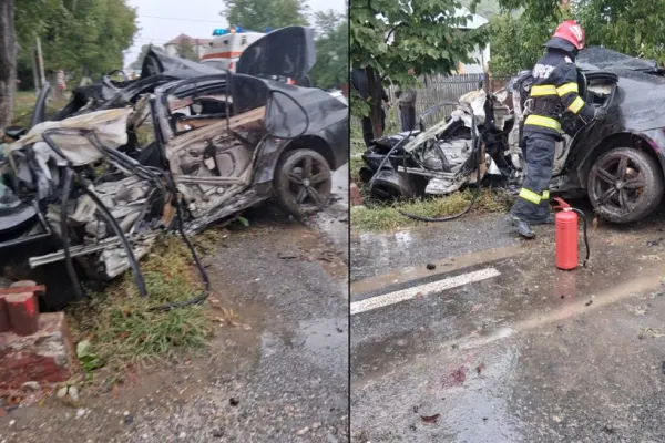Grav accident rutier: un BMW făcut praf, două persoane rănite. Șoferul luptă pentru viață