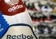 Adidas vrea să concedieze 300 de salariaţi de la Reebok