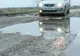 DRUM DE ŢARĂ: DN2 N, care face legătura între Vrancea şi Brăila e plin de gropi