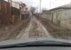 Noroi până la glezne pe o stradă din Bucureşti
