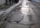 Strada Cazărmii din Caransebeş este peticită şi plină de gropi