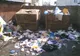 Containere înecate în gunoaie