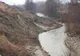 Halda de steril de la Mateeşti, judeţul Vâlcea, s-a pus din nou în mişcare şi ameninţa un râu