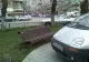 Parcat pe trotuar în faţa unui părculeţ