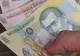 Romania's leu slips to 4.19 over the euro affected by down flow on global markets  