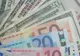 Românii din Spania au trimis mai mulţi bani în ţară în 2008 decât în 2007