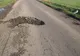 Gropi imense pe DN 211 din judeţul Brăila