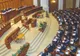 Finance minister defends budget revision in Parliament, says it will bolster economic growth in 2010