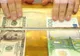 Marţi, leul a pierdut patru bani în raport cu euro. Cursul afişat de BNR este de 4,2306 lei/euro