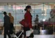 Pasagerii care prezintă simptome de gripă nouă vor fi opriţi să urce în avion în Marea Britanie