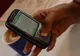 Românii folosesc telefonul mobil doar pentru agendă şi deşteptător