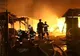 Un incendiu de proporţii a izbucnit în timpul nopţii într-un târg comercial din Craiova