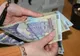 În 2010 salariul minim va fi de 705 lei la stat şi 600 de lei la privat