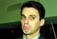 Mircea Badea a apărut gol şi cu pene pe fund, în Piaţa Victoriei - VEZI VIDEO