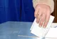 O femeie din comuna Plopana - Bacău, surprinsă cu două buletine de vot