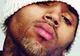 Rapperul Chris Brown, ţinta unui atac armat
