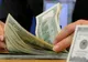 CURS BNR. Dolarul bate record după record la BNR. Moneda americană, la un nou maxim istoric