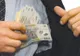 O femeie acuzată că a prejudiciat statul cu peste trei milioane de lei a fost reţinută